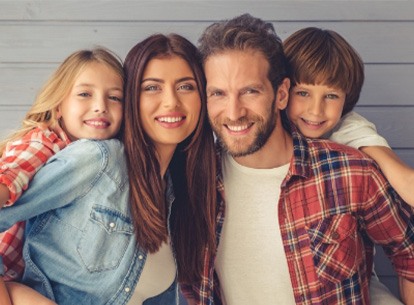 smiling family in Family Dental Center of East Texas   
