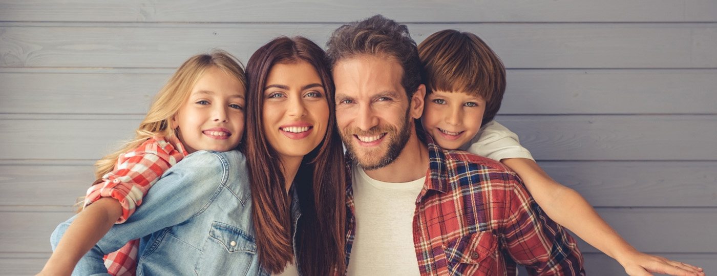 smiling family in Family Dental Center of East Texas   